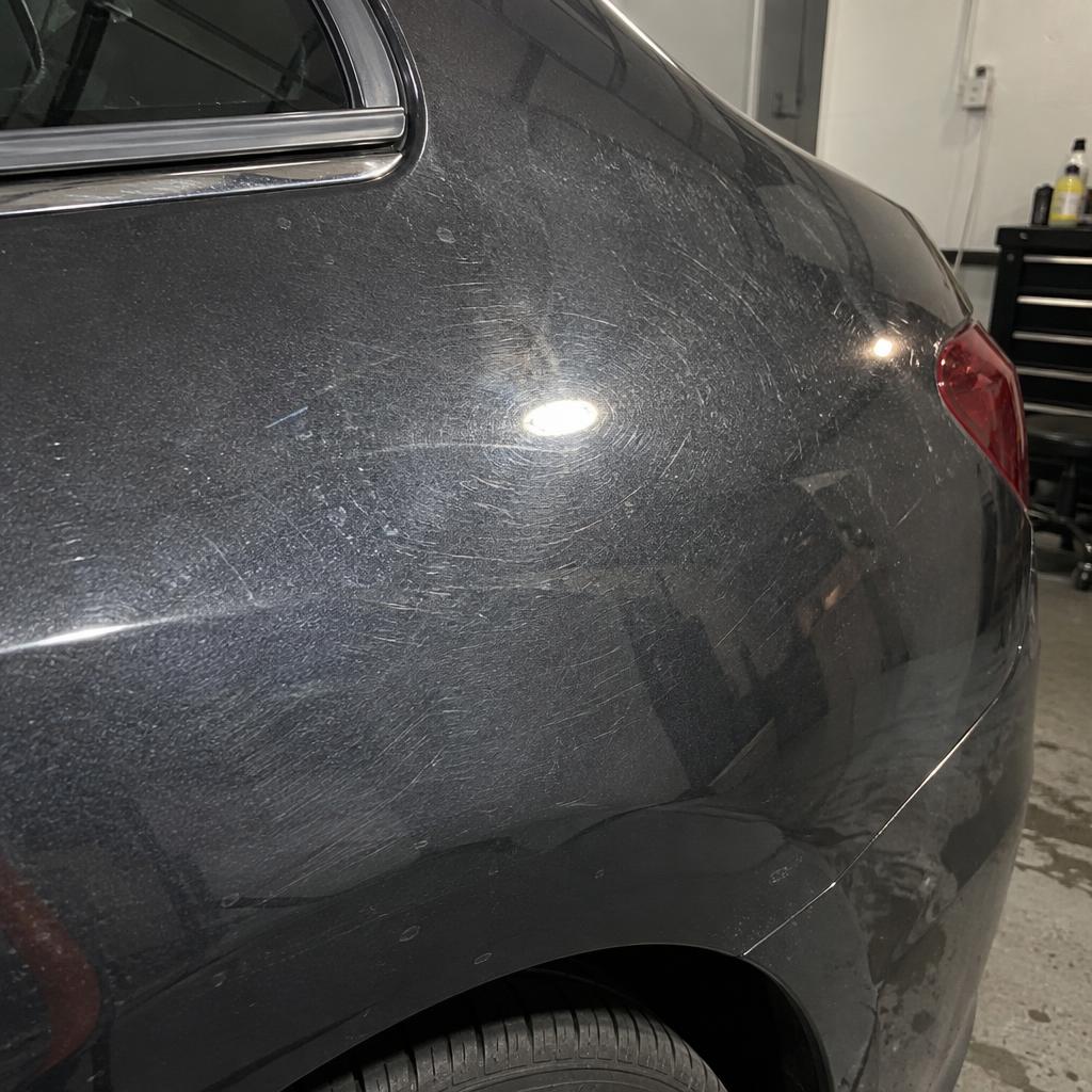 Car paint covered in swirl marks before correction
